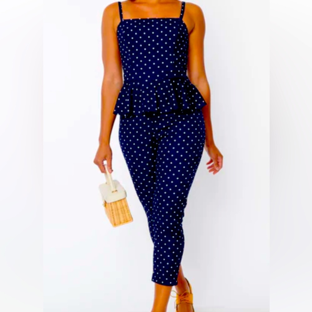Unique vintage navy polka dot peplum jumpsuit